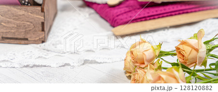 Colored ribbons and lace in coils for hobbies 128120882