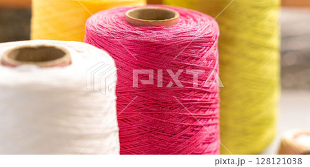 Threads in reels. Colored bobbins for embroidery knitting hobby accessories creativity. 128121038