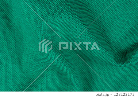 Close-Up of Abstract Green Emerald Cotton Textile Surface Top View Close-Up of Abstract Green Emerald Cotton Textile Surface Top View 128122173