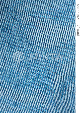 Macro Texture Background of Light Blue Jeans Material. 128122209