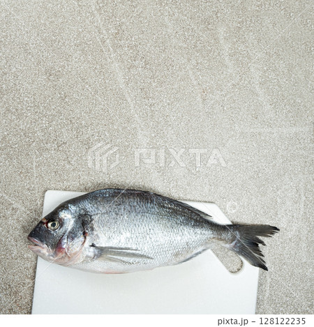 Raw Uncooked Dorado Sea Bream Fish, Place for Text 128122235