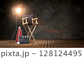 Empty director chair illuminated by spotlight. Film production and movie backstage. 3d illustration 128124495