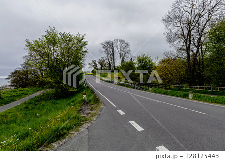 Empty highway early in the morning. Natural landscape. 128125443