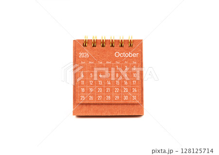 October 2026. Front view of mini desk calendar on white color background. 128125714