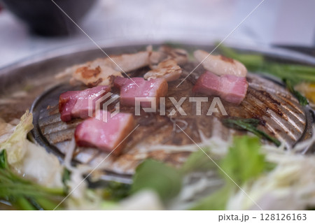 Thai style pork, bacon and seafood barbecue with vegetable soup Thai style pork, bacon and seafood barbecue with vegetable soup 128126163