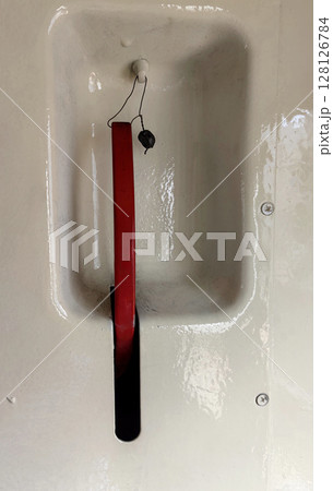 emergency brake mechanism in train carriage system for safety during operation and travel. closeup. emergency brake mechanism in train carriage system for safety during operation and travel. closeup. 128126784
