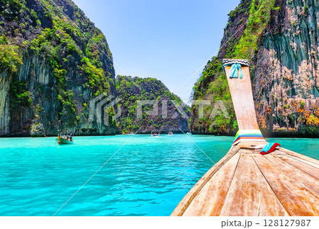 View of amazing landscape with turquoise water of Loh Samah Bay on Phi Phi Island, Thailand. This small bay is on the other side of Maya Bay on Phi Phi Leh Island in Thailand. 128127987