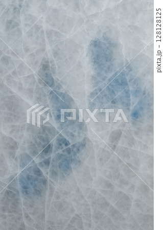 Translucent Quartz Close-Up Revealing Icy Crystalline Veins and Intricate Frosted Lattice 128128125