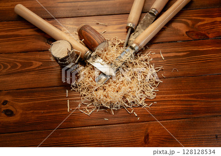 Workshop with tools on wooden table Workshop with tools on wooden table 128128534