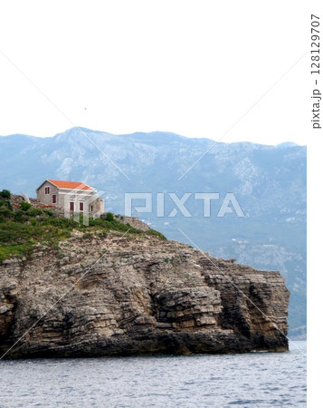 Lighthouse on Sveti Nikola Island Overlooks the Adriatic Sea in Montenegro 128129707