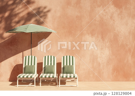 Striped Chairs and Umbrella 128129804