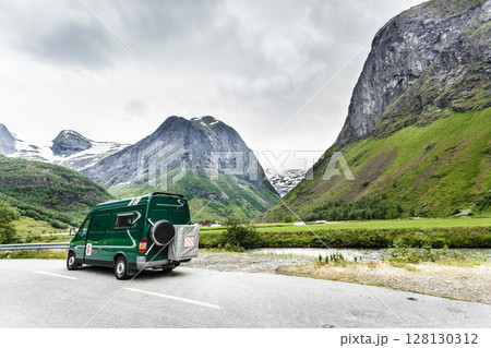 Camper car in norwegian mountains 128130312