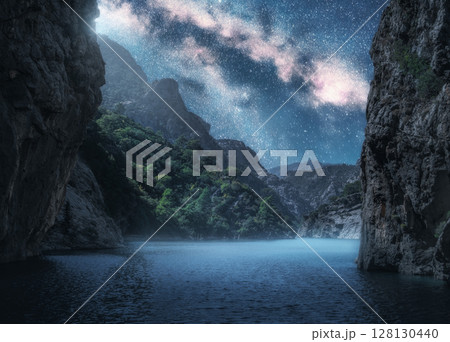 Milky Way over the beautiful mountain canyon and sea at night 128130440