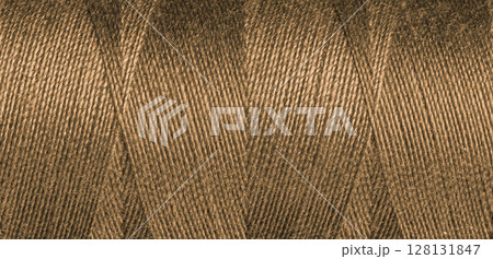 Brown sewing thread texture Brown sewing thread texture 128131847