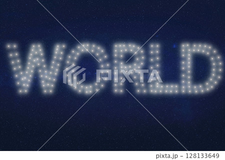The word WORLD appears formed by clusters of white lights against a star-like black background. The word WORLD appears formed by clusters of white lights against a star-like black background. 128133649