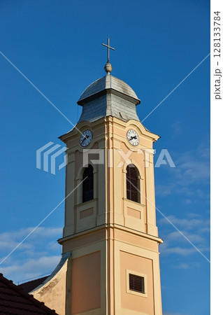 Old church tower renovated 128133784