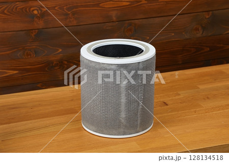 Dirty air purifier filter replacement, full of dust Dirty air purifier filter replacement, full of dust 128134518