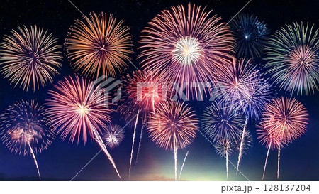 夜空に輝く綺麗で美しい打ち上げ花火のイメージ 背景素材 16:9サイズ AI生成素材 128137204