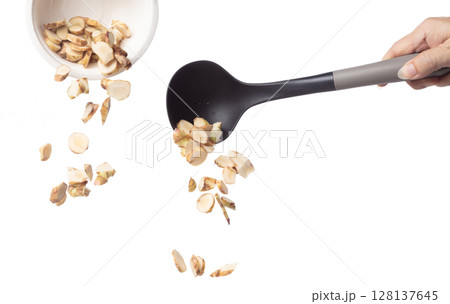 Galangal fall fly in turner, fresh vegetable spice galangal falling. Organic fresh herbal galangal root head cut chop slice, close up texture. White background isolated freeze motion high speed Galangal fall fly in turner, fresh vegetable spice galangal falling. Organic fresh herbal galangal root head cut chop slice, close up texture. White background isolated freeze motion high speed 128137645