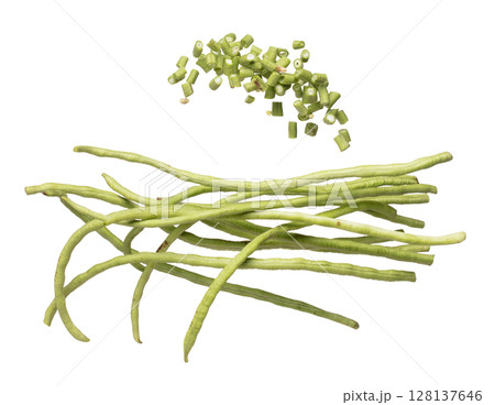 Long yard bean fly explosion, many group green long beans for food cooking float in air. Raw long yard bean throw in mid air as food material. White background isolated high speed freeze motion 128137646