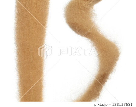 Sand flying explosion, Golden grain wave explode. Abstract cloud fly. Yellow colored sand splash throwing in Air. White background Isolated high speed shutter, throwing freeze stop motion 128137651