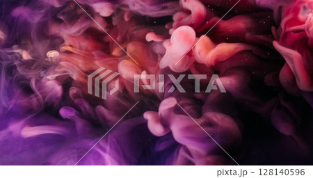 Mix color swirling. Mist wave. Defocused purple pink paint in water liquid flowing on abstract art dark black wet background. Mix color swirling. Mist wave. Defocused purple pink paint in water liquid flowing on abstract art dark black wet background. 128140596