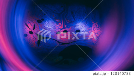 Ink blur mix. Neon fluid flow. Bokeh round lens effect colorful tunnel whirl frame. Blue pink sphere light reflection on black background. Ink blur mix. Neon fluid flow. Bokeh round lens effect colorful tunnel whirl frame. Blue pink sphere light reflection on black background. 128140788