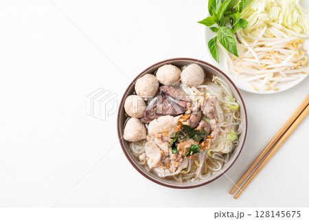 Thai noodles soup with sliced pork, minced pork, meatball and liver, Traditional Thai street food Thai noodles soup with sliced pork, minced pork, meatball and liver, Traditional Thai street food 128145675