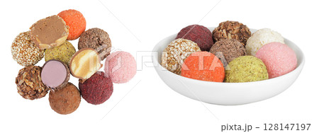 A variety of different truffles in ceramic bowl Isolated on a white background. Top view. Flat lay A variety of different truffles in ceramic bowl Isolated on a white background. Top view. Flat lay 128147197