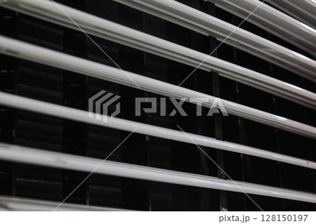 Abstract Background Featuring Parallel White Slats and Dark Shadows Abstract Background Featuring Parallel White Slats and Dark Shadows 128150197