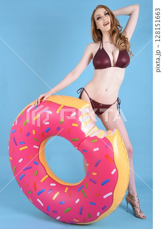 Beautiful redhead model dressed in various outfits for Summer 128151663