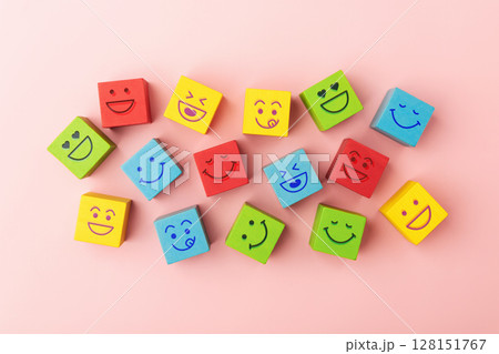Group of Colourful Smiling Emoticon Diversity Face on Multi-colour Cube. Mind Mental Health. Happy Community. World Happiness, International Smiling Day. Table Top View Group of Colourful Smiling Emoticon Diversity Face on Multi-colour Cube. Mind Mental Health. Happy Community. World Happiness, International Smiling Day. Table Top View 128151767