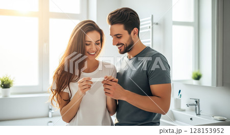 A couple looking at a pregnancy test together, sharing a joyful and emotional moment. The concept of partnership, new life, and the beginning of parenthood. Generative AI. 128153952
