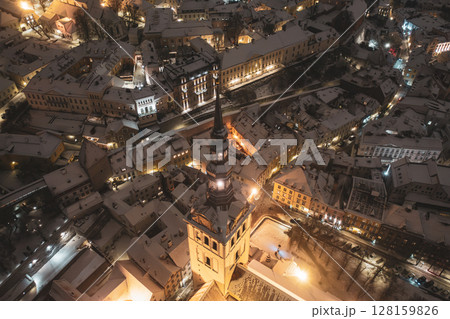 Aerial night View of Tallinn in winter, roofs are covered with snow, Christmas mood 128159826