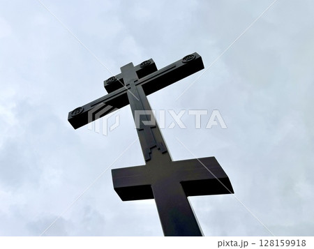 cross against blue sky. High quality photo 128159918