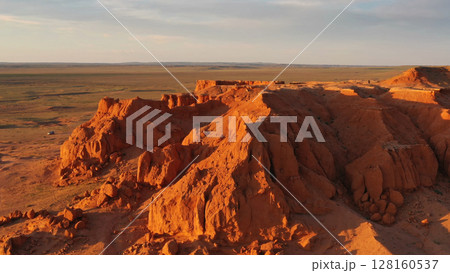Bayanzag flaming cliffs at sunset in Mongolia Bayanzag flaming cliffs at sunset in Mongolia 128160537