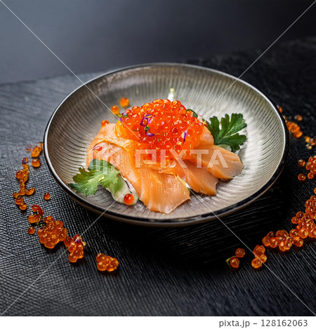 Exquisite Salmon Dish with Red Caviar 128162063