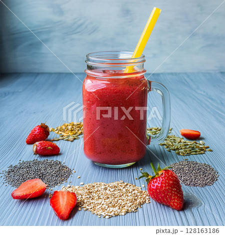 Vibrant Red Smoothie in Glass Jar 128163186