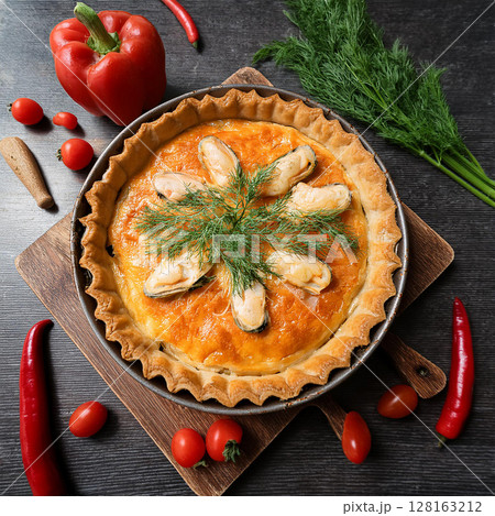 Golden Seafood Pie on Rustic Cutting Board 128163212