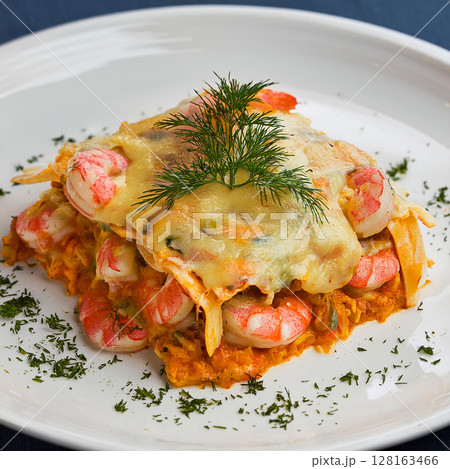 Seafood Lasagna Beautifully Garnished on Plate 128163466