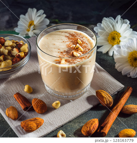Creamy Beverage with Nuts and Cinnamon 128163779