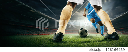 Soccer players face-off on 3D stadium field in competitive match 128166489