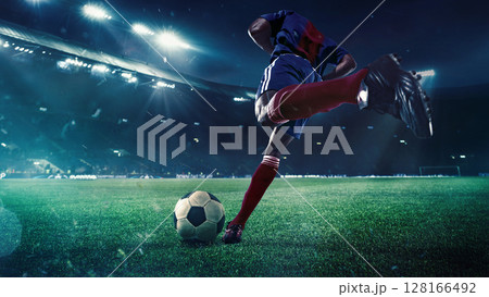 Football player preparing to shoot ball on 3D stadium field at night Football player preparing to shoot ball on 3D stadium field at night 128166492