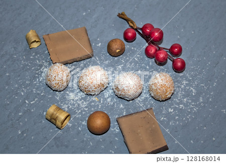 delicious cocoa balls dipped in natural coconut handmade at home delicious dessert 128168014