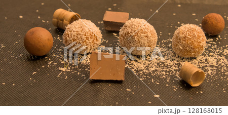 Homemade chocolate bonbons handmade at home dipped in natural coconut 128168015