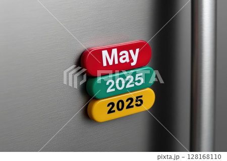 Colorful magnets display the month of May and year 2025 on a kitchen refrigerator surface 128168110