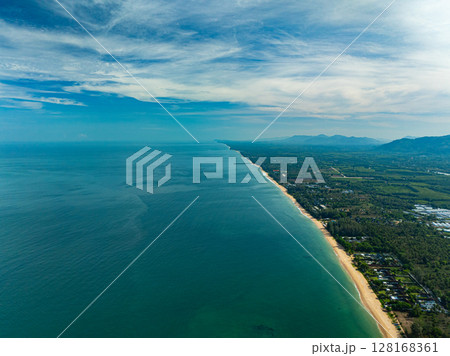 Ocean waves crashing on rocks as seen from an aerial perspective Ocean waves crashing on rocks as seen from an aerial perspective 128168361