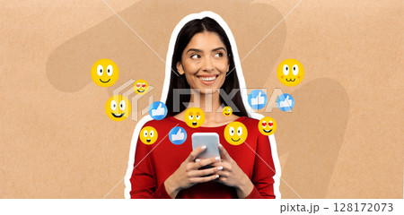 A young Middle Eastern woman in a red top smiles while using her smartphone. She appears engaged in conversation, surrounded by cheerful emojis, reflecting her enjoyment of social media interactions. A young Middle Eastern woman in a red top smiles while using her smartphone. She appears engaged in conversation, surrounded by cheerful emojis, reflecting her enjoyment of social media interactions. 128172073