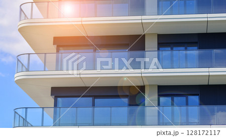 Downtown modern residential architecture. Architectural details of modern apartment building. Modern european residential apartment building complex. Downtown modern residential architecture. Architectural details of modern apartment building. Modern european residential apartment building complex. 128172117