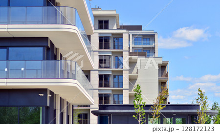 Downtown modern residential architecture. Architectural details of modern apartment building. Modern european residential apartment building complex. 128172123